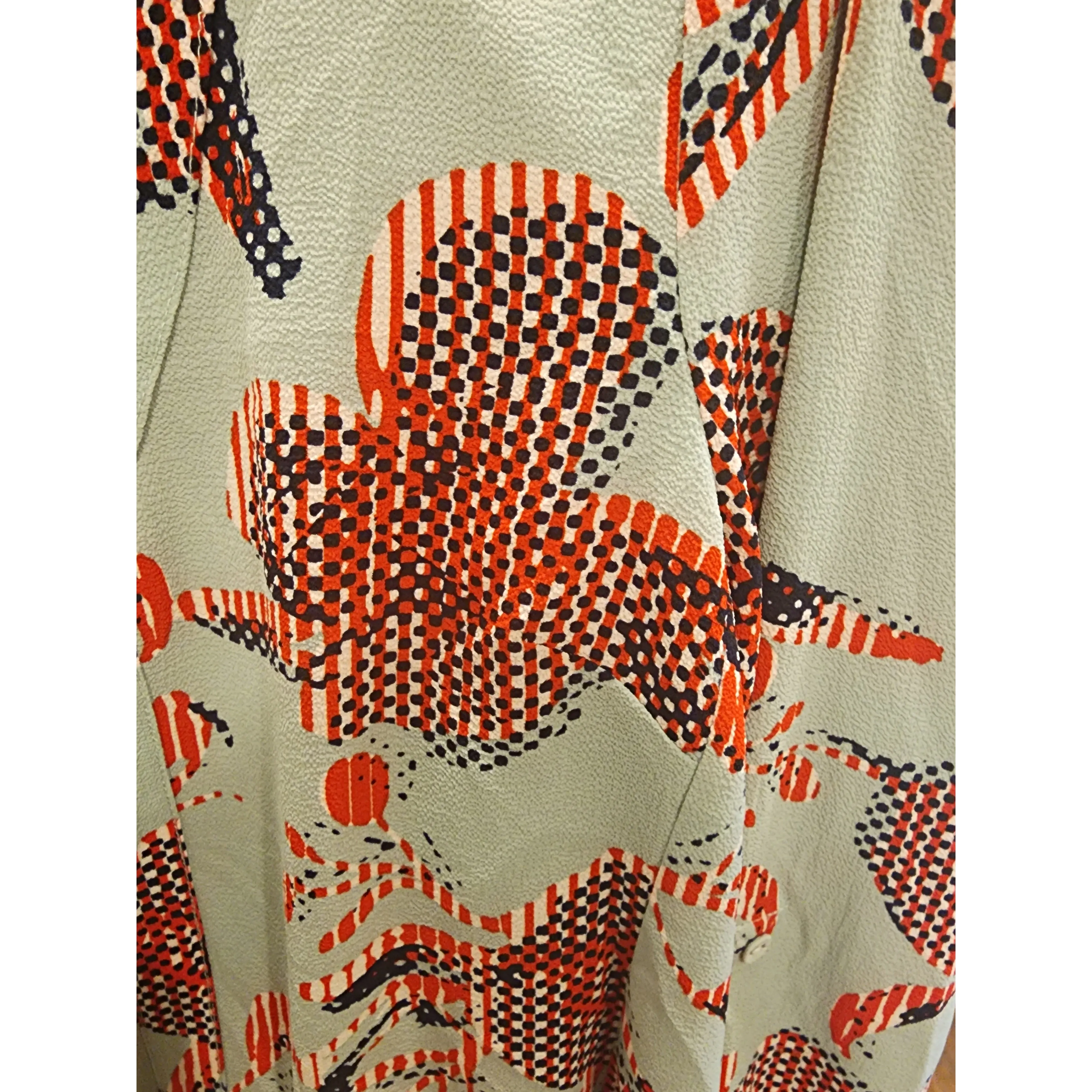 Blue and red long sleeve collarless shirt with v-neck size S (best fits size 10)