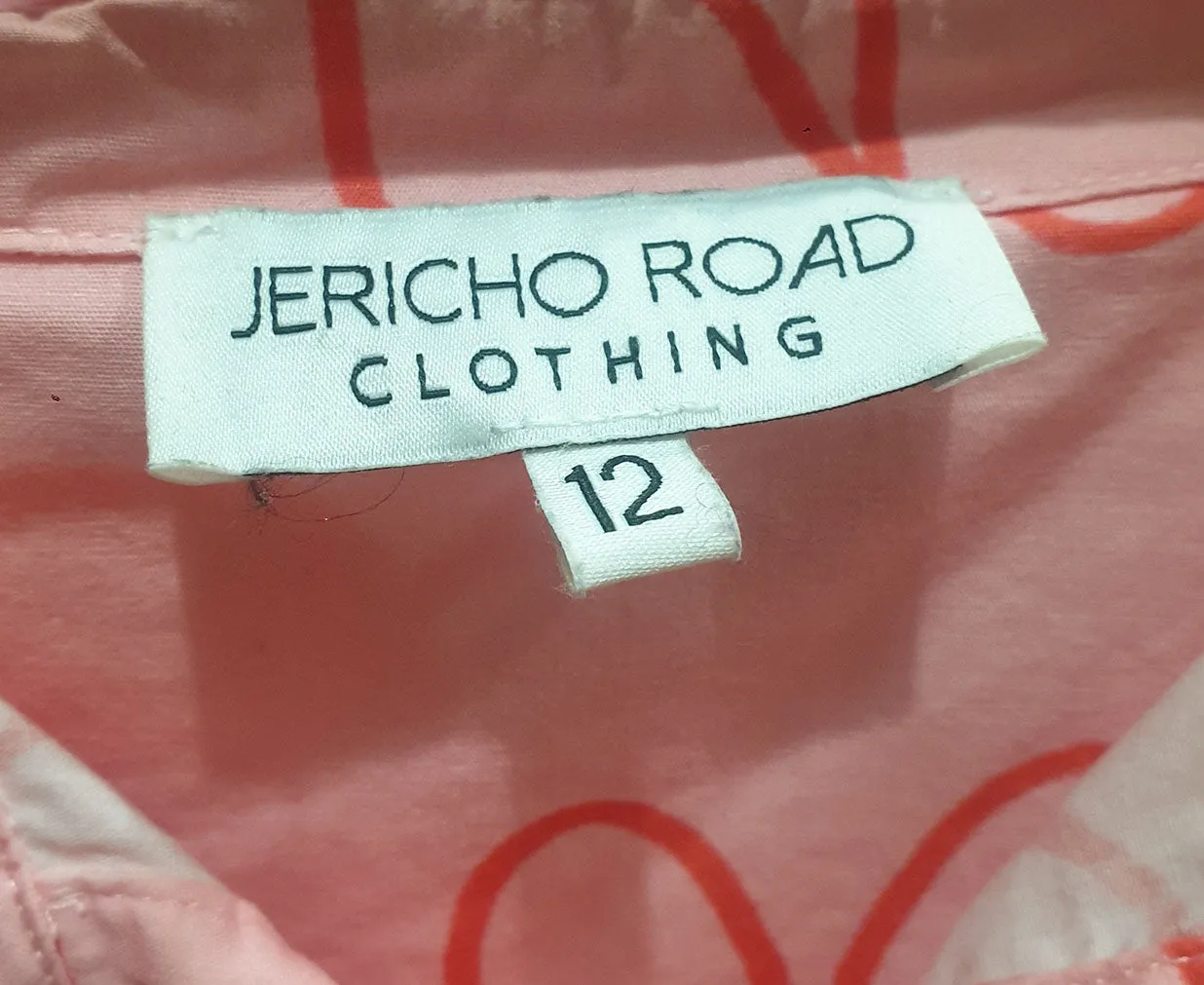 Jericho Road pink flower print shirt size 12, best fits 10
