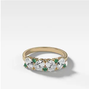 Oval Diamond And Green Emerald Medley Halfway Wedding Band