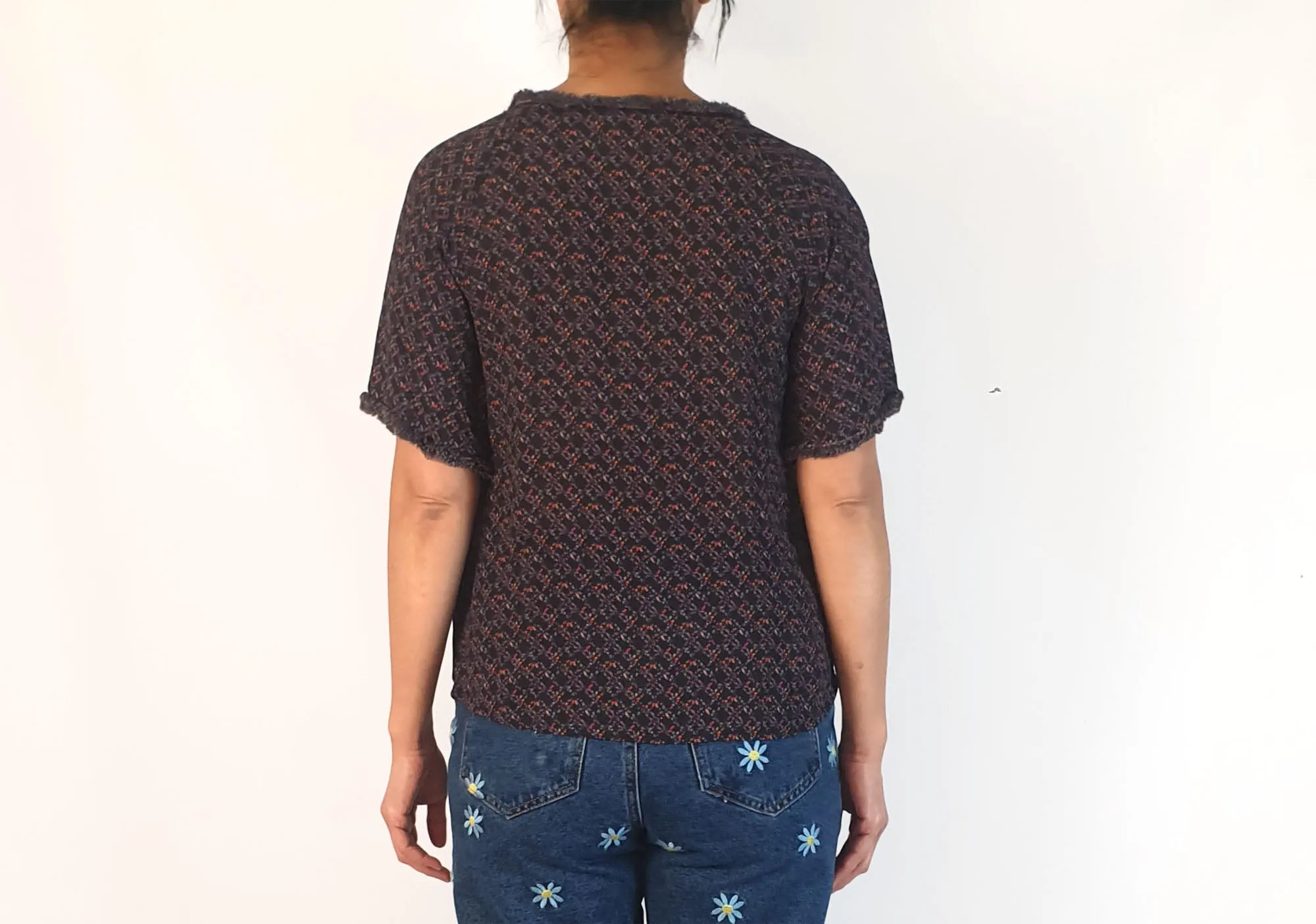 Skin & Threads silk feel dark print top with cute freying detail size 2, fits 10